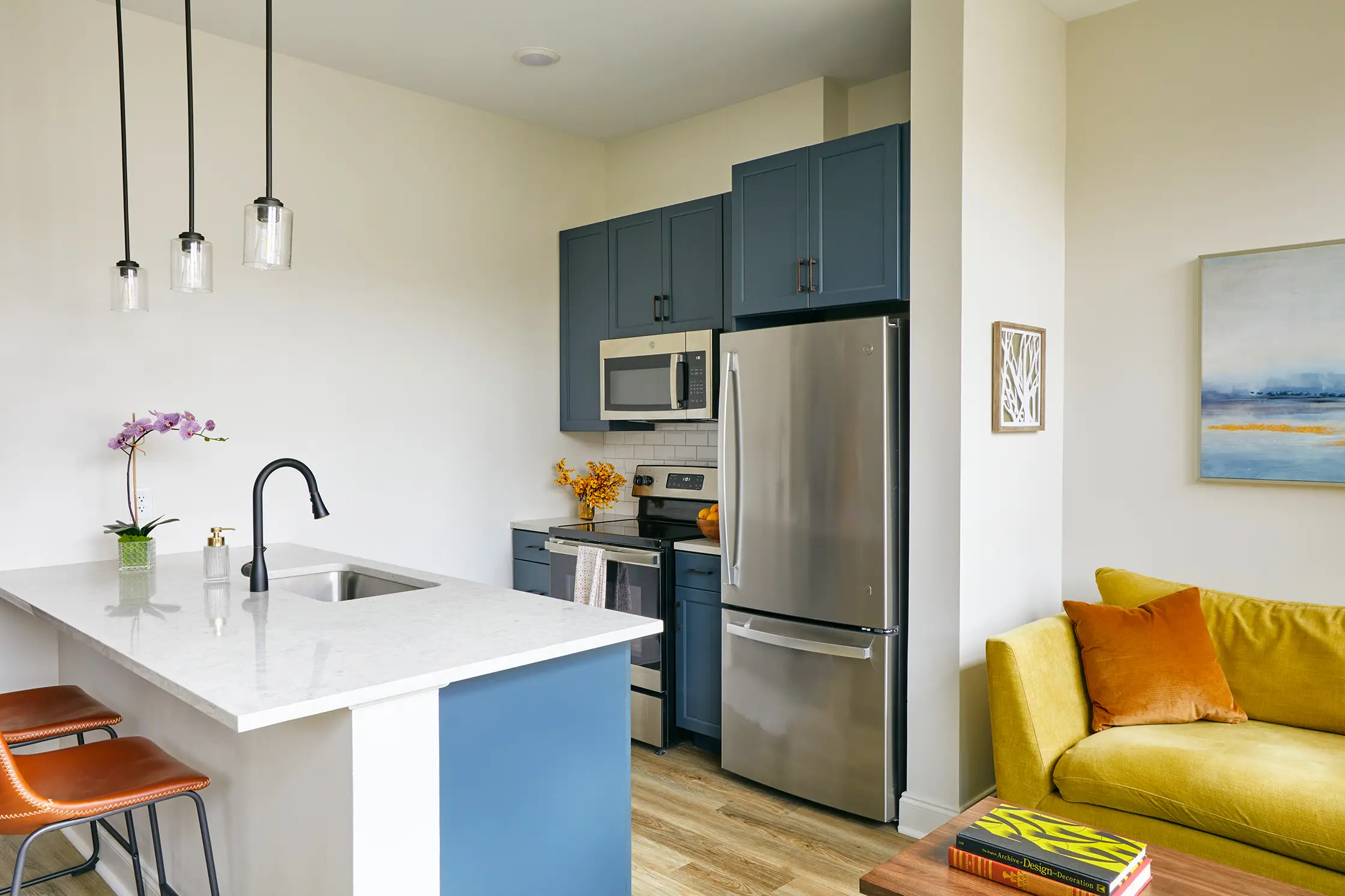 Luxury kitchen with minimalist modern design in The Tribute, a premier apartment complex in downtown Knoxville.