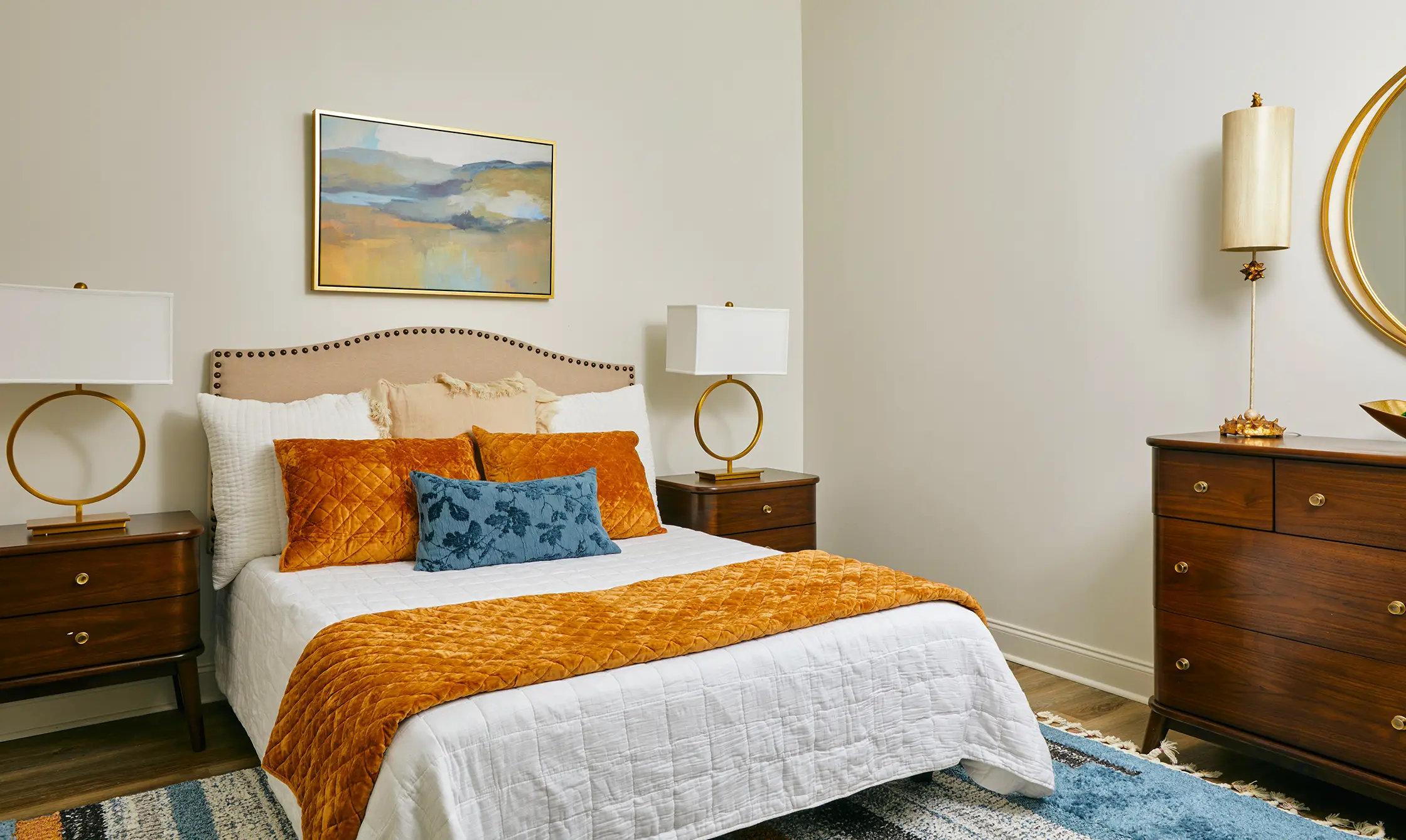 Modern bedroom with elegant decor in The Tribute, a luxury apartment complex in downtown Knoxville.
