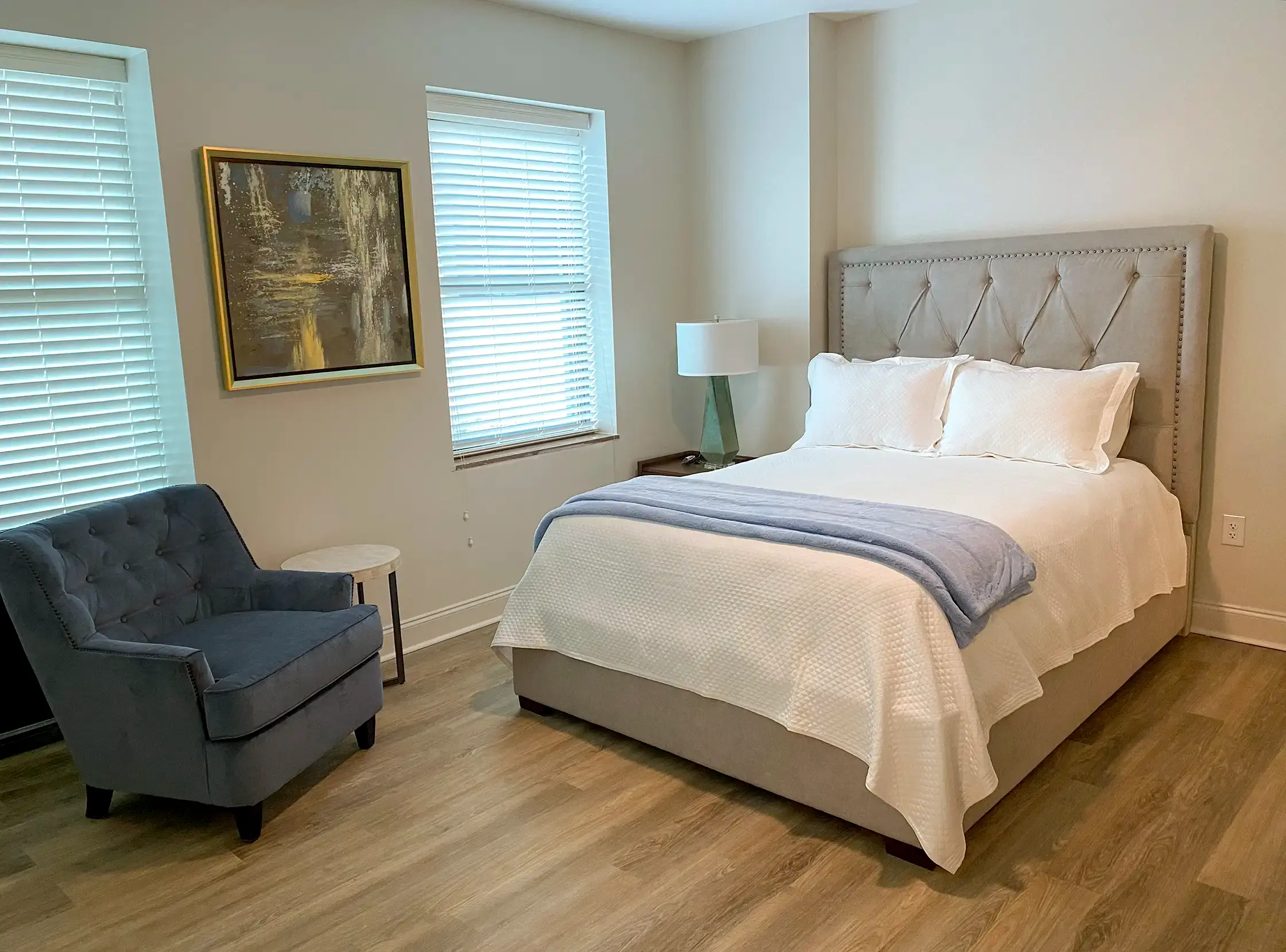 Modern bedroom with sophisticated details in The Tribute, a downtown Knoxville luxury apartment.