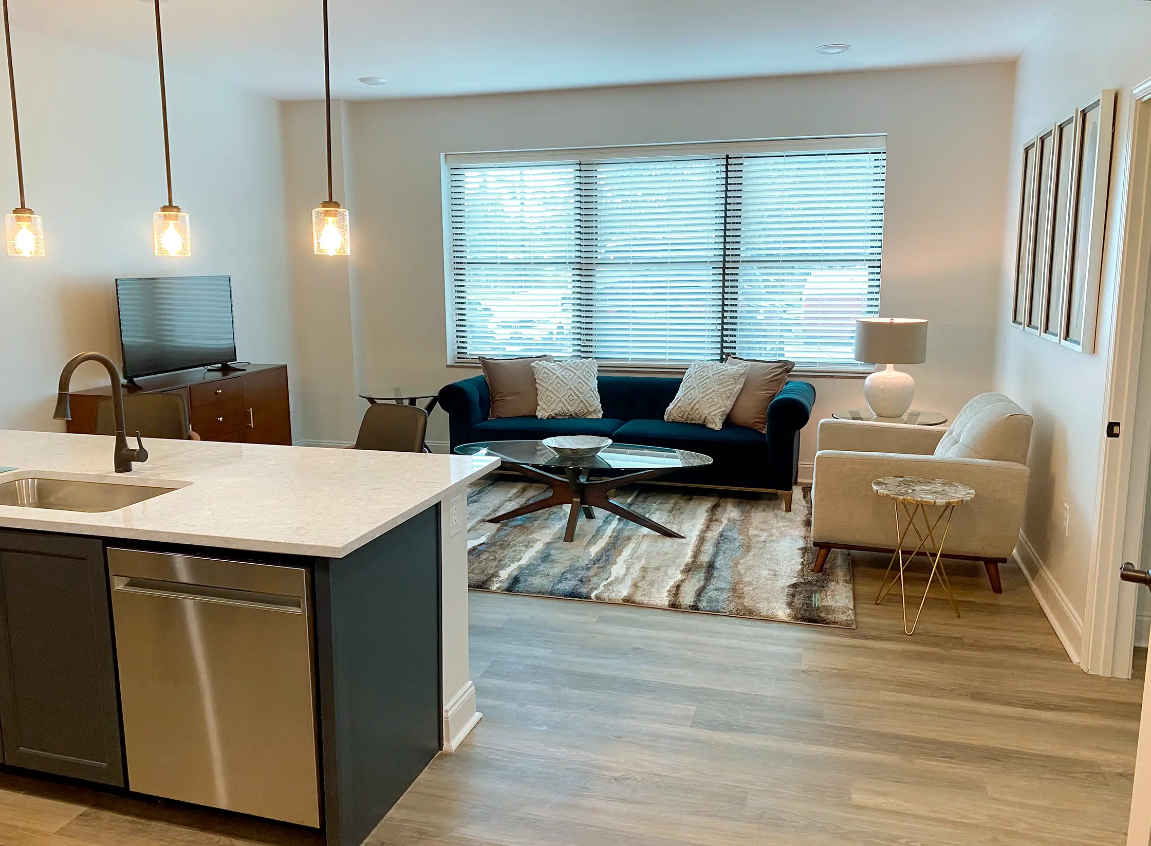 Modern living area with premium finishes at The Tribute, a luxury apartment in downtown Knoxville.